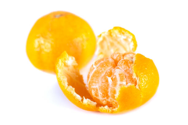 istock Open tangerine with slices on a white background. Mandarin. 1195655043