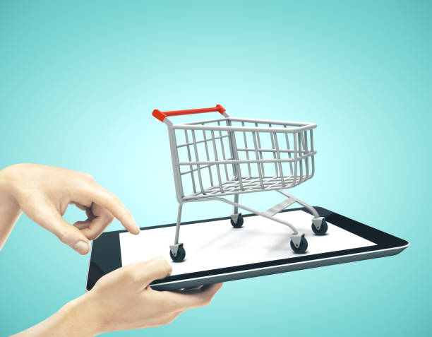 istock tablet with shopping cart 1195656836
