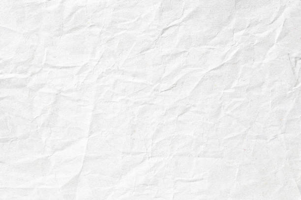 istock Crumpled white grey paper background texture 1195663358
