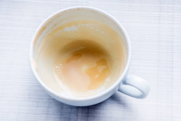 istock Close up of empty dirty white cup of coffe 1195664010