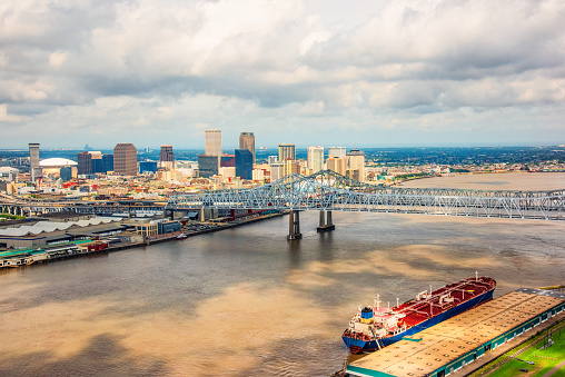 The city skyline of New Orleans, Louisiana, along the banks of the Mississippi River shot from an altitude of about 800 feet
