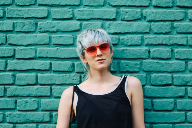 istock Cool girl with sunglasses posing 1195669506