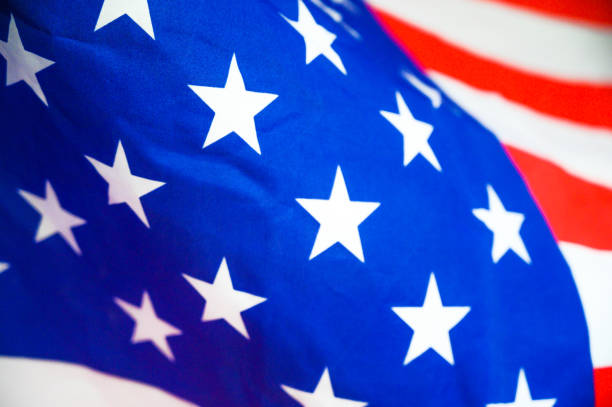 istock America flag waving with the wind for memorial day. 1195679620