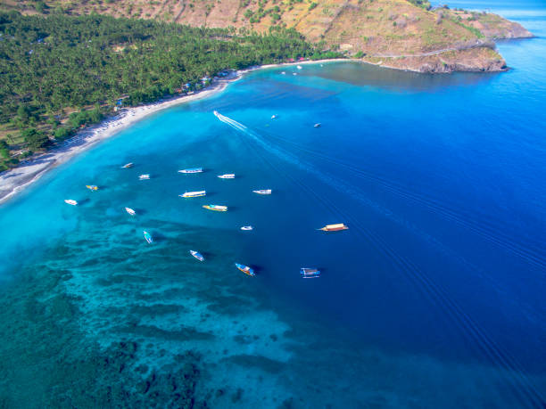 istock Aerial Longtail Boats with Tropical island 1195682247