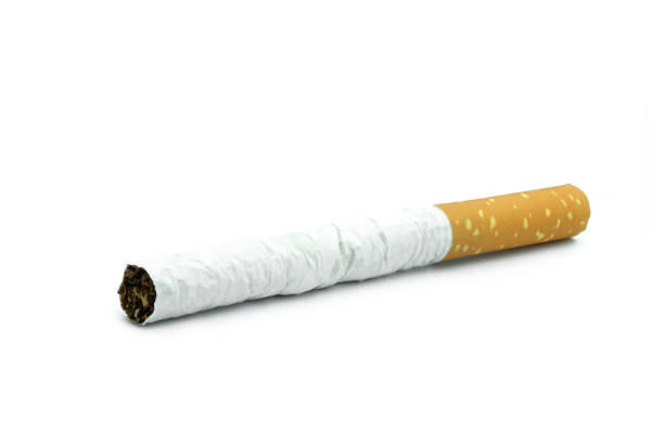 istock Cigarettes on a white background. Health concept and stop smoking 1195683202