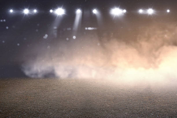 istock Running track with smoke and spotlights 1195685508
