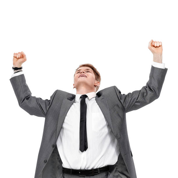istock Very happy successful gesturing young business man 1195688380