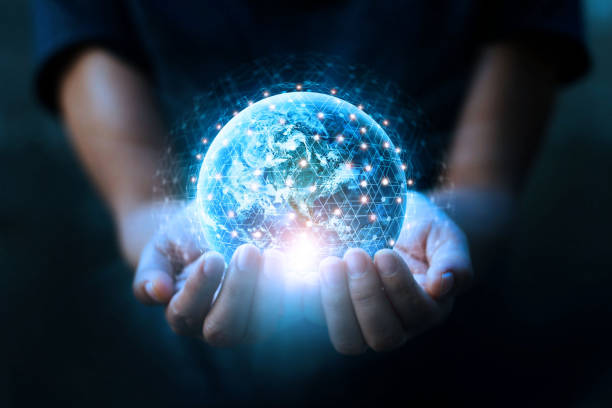 istock Man hands holding blue earth and global networking connection and data exchanges, global communication network concept, Elements of this image furnished by NASA. 1195693425