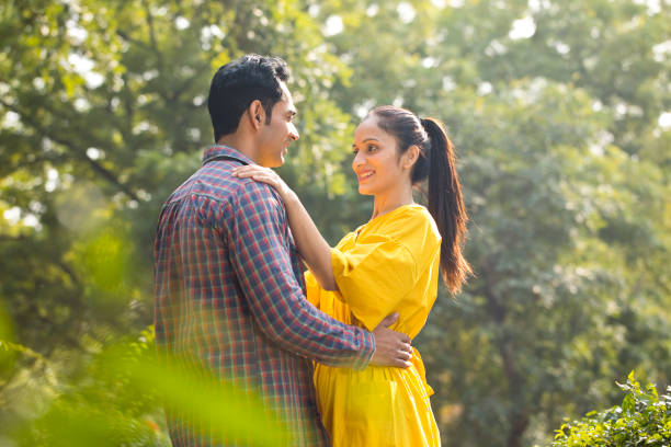istock Romantic couple at park 1195696294