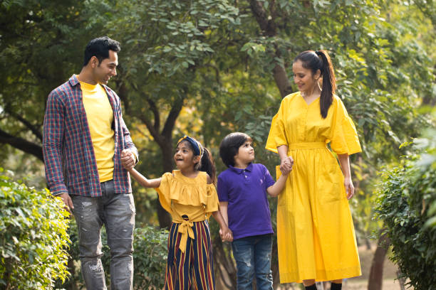 istock Happy family at park 1195697130