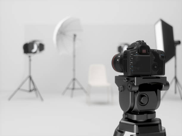 istock Digital photo camera on tripod in the Studio 1195699629