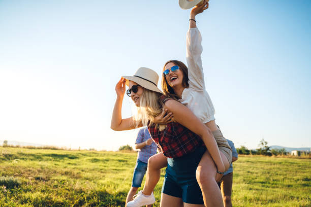 istock Friends piggyback 1195706752
