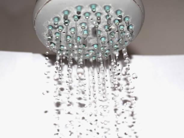 istock drops of water from shower head 1195710260