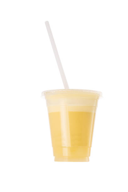 istock Fresh Fruit Smoothie Shake in a plastic cup and straw isolated on white background 1195713930