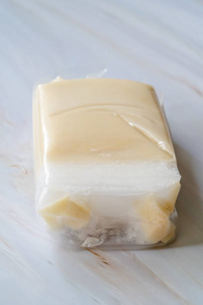 istock Instant Solid Organic Coconut Milk Cream in Plastic Package for Sale. 1195715399