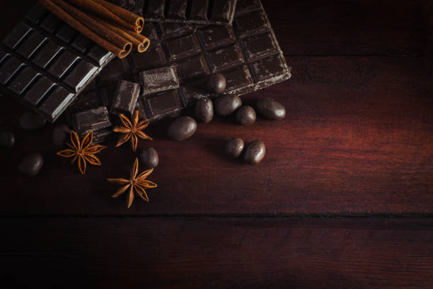 istock Chocolate, Cinnamon, Chocolate Balls on a Dark Wooden Background. Copy space. Flat lay, top view 1195717176