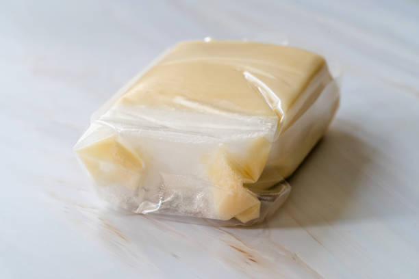 istock Instant Solid Organic Coconut Milk Cream in Plastic Package for Sale. 1195717429