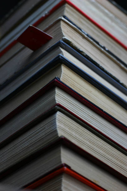 istock books in color covers close up stacked in a row 1195722867