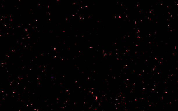 istock Abstract background with red shiny sparkling sparkles. Particles of colored dust sparkles. 1195724642