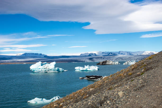 istock melting glacier pieces in lagoon 1195727329