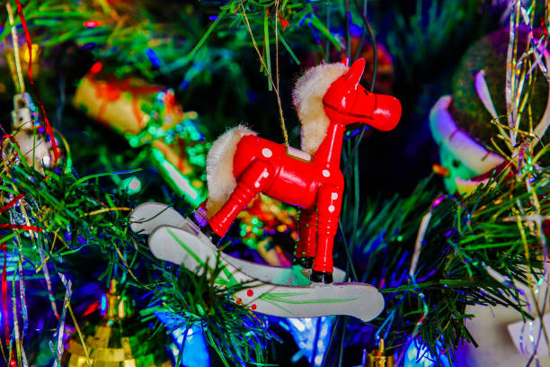 istock Rocking horse on Christmas Tree 1195727344