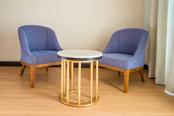 istock Colored chairs from fabric and suede on a laminate floor 1195728109