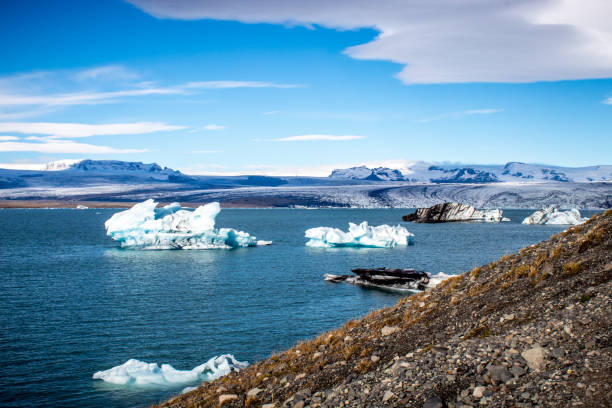 istock melting glacier pieces in lagoon 1195728304