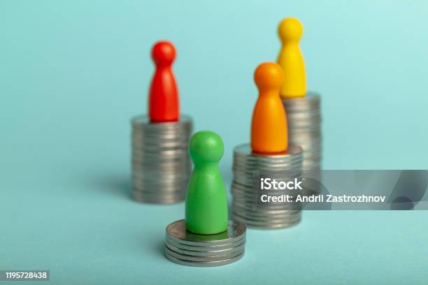 Low And High Salaries Business Competition Personal Financial Success Stock Photo - Download Image Now