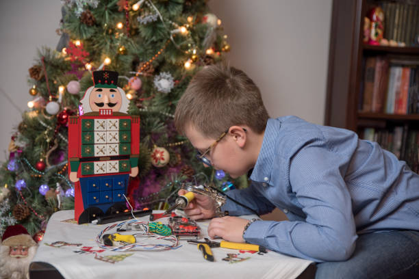 istock a boy playing at home during holidays 1195729446