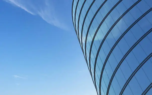 3D stimulate of high rise curve glass building and dark steel window system on blue clear sky background,Business concept of future architecture,lookup to the angle of the corner building.