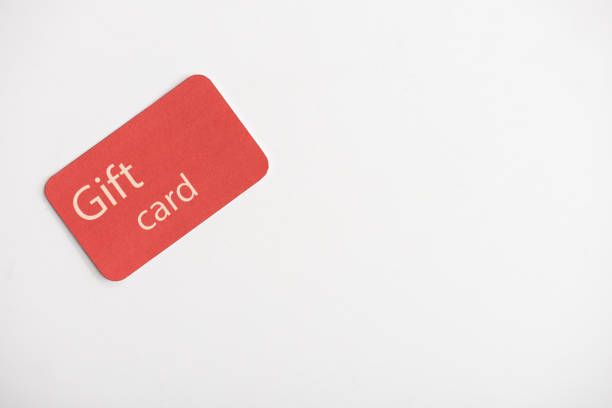 istock Top view of gift card on white surface with copy space 1195731391