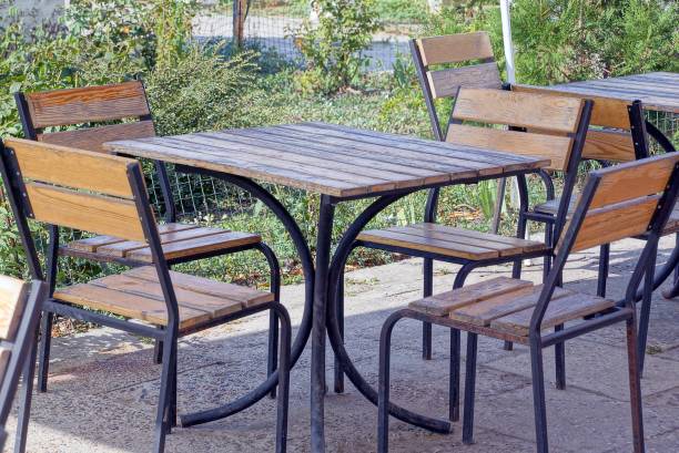 istock table and chairs stand on the street 1195734696