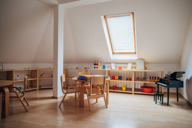 Tables and chairs in modern preschool Empty modern preschool classroom, no people. playroom stock pictures, royalty-free photos & images