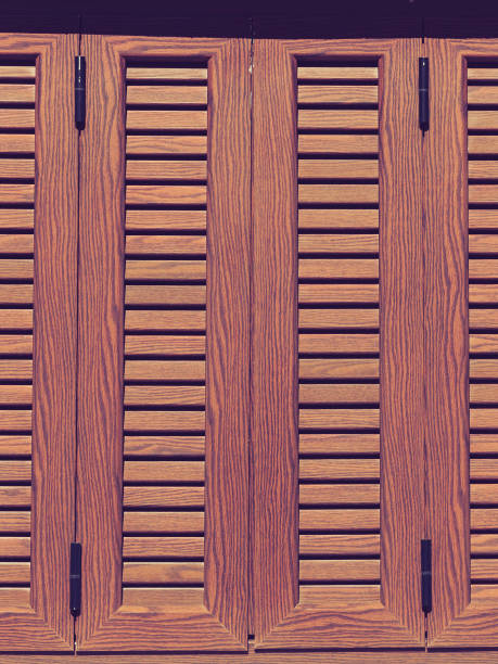 istock Traditional brown shutters window, Greece 1195735805