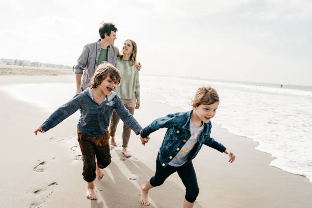 istock Family on the beach 1195737076