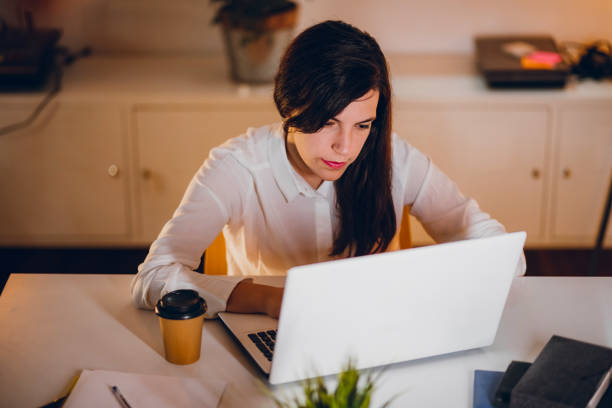 istock Businesswoman working in her office 1195737243