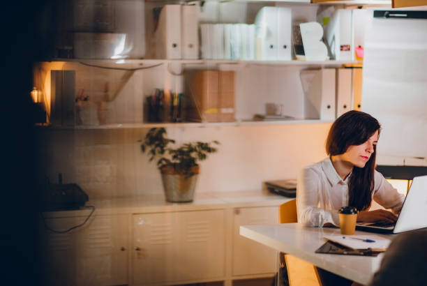 istock Businesswoman working in her office 1195737255