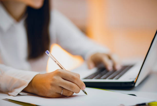 istock Businesswoman working in her office 1195737910