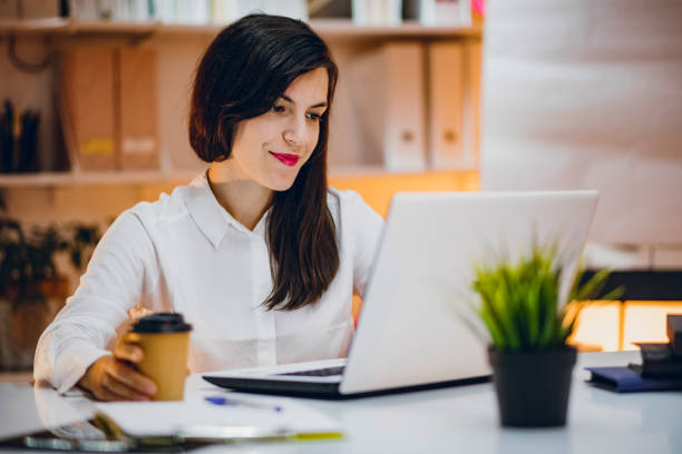 istock Businesswoman working in her office 1195737918