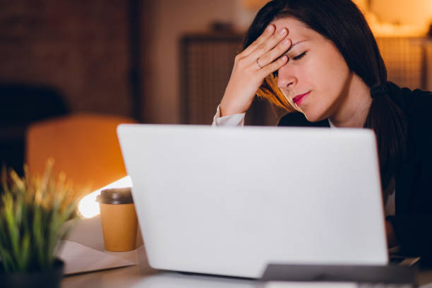 istock Businesswoman having a headache 1195737987