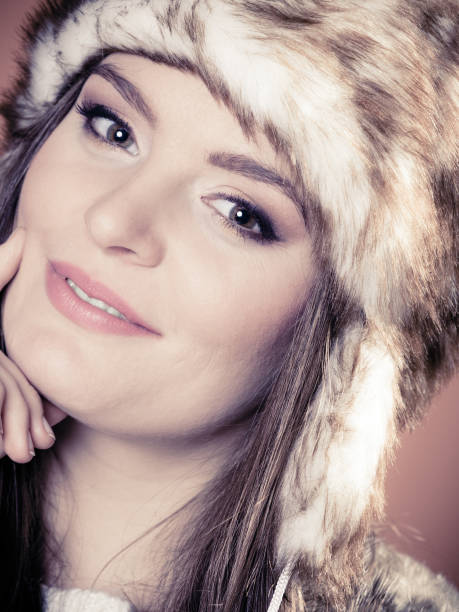 istock Woman in fur cap 1195745488