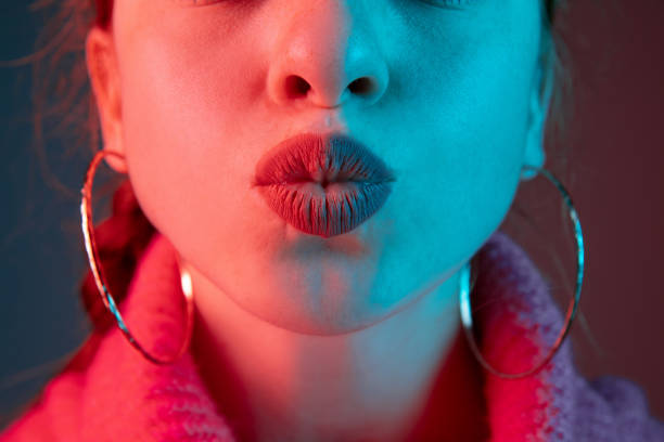 istock Caucasian woman's portrait isolated on gradient studio background in neon light 1195745526