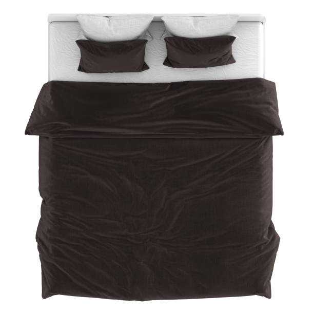 istock Double bed with brown pillows and a blanket on a white background. 3d rendering 1195752873