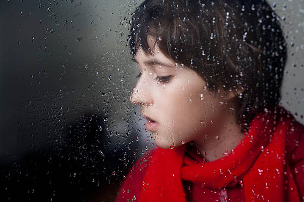 istock sad boy for a wet glass 119575304