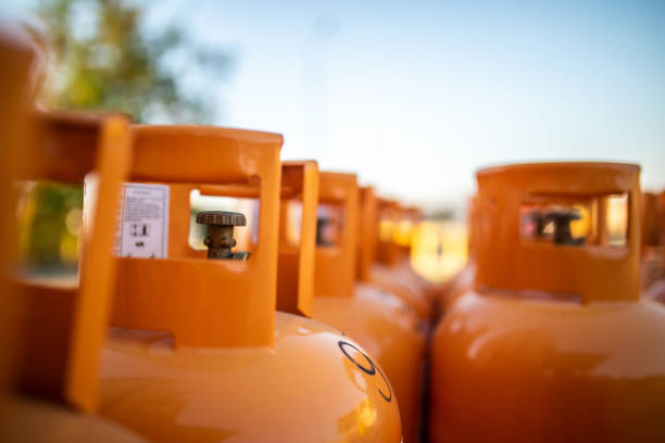 istock Used gas butane cylinder containers 1195754325
