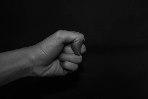 istock Monochrome hand gestures on black background 1195763479