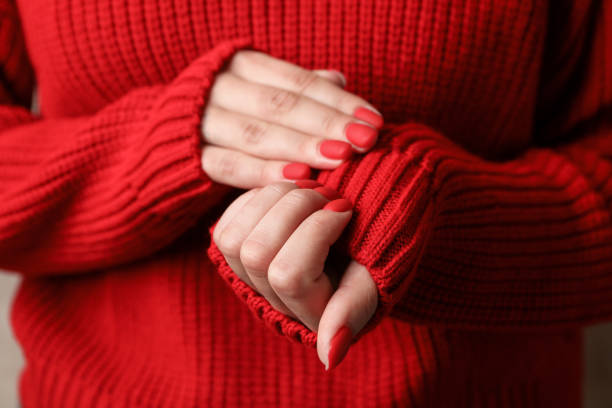 istock Woman hands, stylish red manicure, space for text. Closeup 1195765630