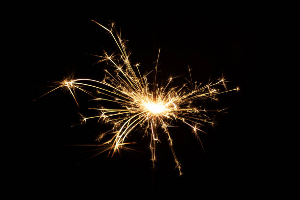 istock Burning sparkler, fireworks for holidays includes christmas, happy new year 1195766805