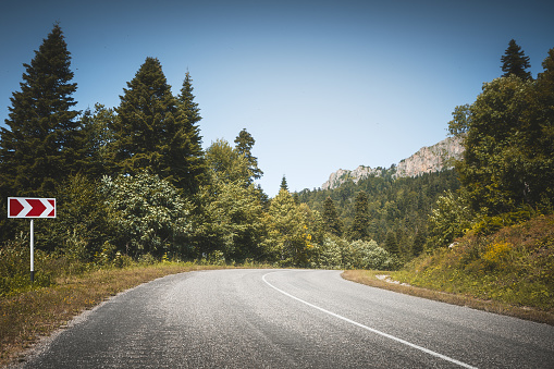 Mountain road. Road curve. Travel