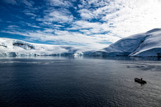 istock Boating in the Antarctic peninsula 1195768166